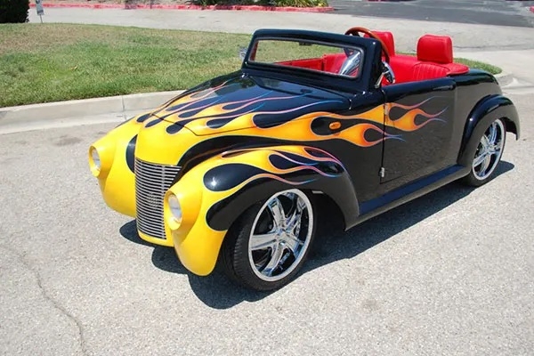 Black 39 Roadster with Yellow Flames affordable golf cart rental, golf cart rent berkeley